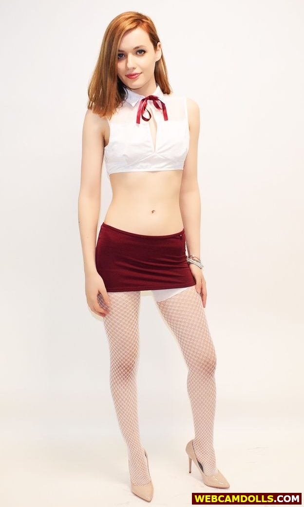 Redhead Girl in White Fishnet Stockings and Beige Stilettos on Webcamdolls